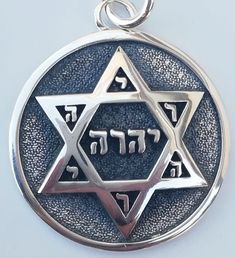 the star of david has been engraved in silver