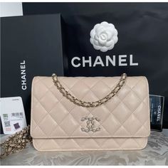 Authentic Chanel Caviar Coco Candy Wallet On Chain Woc In Beige Gold Hw Pearl Cc Mini Bag Rare And Gorgeous 21s Woc Bag In Coveted Beige! It Is A Beautiful Neutral Light Beige That Matches Perfectly With Gold Hardware. The Pearl Cc Logo Is So Stunning And Embodies Signature. Excellent Condition. Flawless Front Exterior. Looks Perfect From The Front And Sides. Clean Interior. Light Rear Corner Wear, Light Rear Patch Pocket Edge Wear, Light Discoloration On Shoulder Of Chain. This Is An Authentic Chanel Pearl Wallet, Chanel Cc Cream, Cherry Vintage, Fur Handbag, Large Envelope, Fur Handbags, Gold Chanel, Wallet On Chain, Pink Cherry