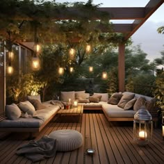 an outdoor living area with couches, lights and plants on the decking floor