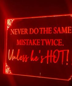 a red neon sign that says never do the same mistke twice unless it's hot