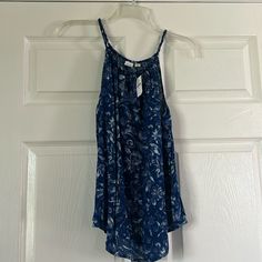 Cute Gap Tank Top, Size Xs. New W Tag. Floral Print. 100% Rayon Trendy Gap Summer Tank Top, Trendy Gap Tank Top For Summer, Gap Summer Tops For Vacation, Casual Blue Tank Top For Day Out, Gap Summer Tops, Gap Sleeveless Summer Tops, Gap Tops For Spring Vacation, Gap Summer Tops For The Beach, Summer Casual Tops By Gap