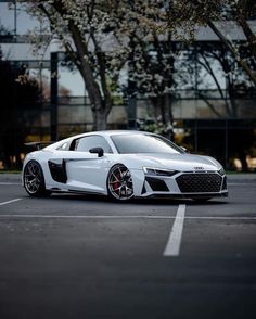 an audi sports car parked in a parking lot