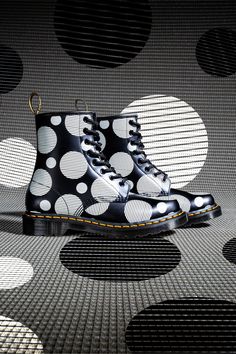 This high-impact Polka Dot print is new for the season — combining polka dots and stripes, it pays tribute to our iconic grooved sole pattern and the grooves on a record. To mix up our Originals collection, we’ve rebooted our 1460 boot with black polka dots. Built on our Smoke DMS sole and featuring unmistakable yellow stitching. Sole Pattern, Design Camp, Boots Uk, Black Polka Dot, Polka Dot Print, Dot Print, White Polka Dot, Lace Up Boots, Polka Dot