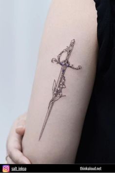 Swords and flowers are the perfect match, especially when we’re talking about tattoo motifs. A sword tattoo with a lily of the valley, for example, can be a great way to represent the purity, peace, sincerity, and joy that come with the courage to do what you want to do with your life. Swords Back Tattoo, Masculine Tattoos, Magic Tattoo, Ocean Tattoos, Sternum Tattoo, Vine Tattoos, Spine Tattoos For Women, Face Tattoo