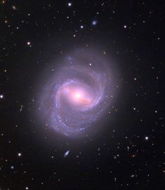 an image of a spiral galaxy in the sky