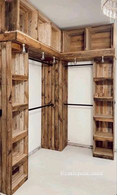 a room that has some wooden shelves and shelving units in the middle of it