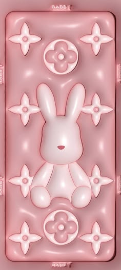 a pink plastic object with an image of a bunny on it