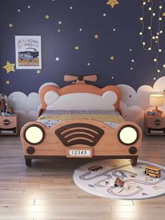 a child's bedroom with a toy car bed and night lights on the nightstands