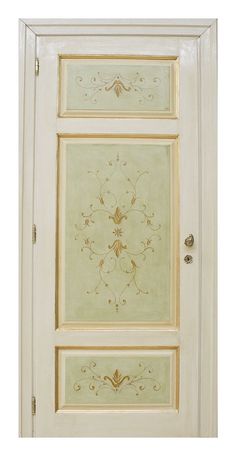 the door is painted white and has an ornate design on it's side panel