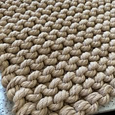 a close up view of a knitted rug