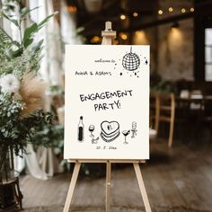 an easel with a sign that says engagement party