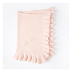 a pink blanket with ruffles on the bottom that says,'little miss '