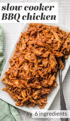 slow cooker bbq chicken on a white plate with text overlay reading slow cooker bbq chicken 6 ingredients