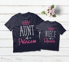 two matching shirts with the words, queen and prince on them in pink ink against a white wood background