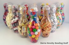 there are many different types of candy in the bottles