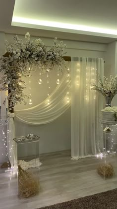 an elegant wedding setup with white flowers and lights