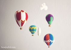 several hot air balloons are flying in the sky