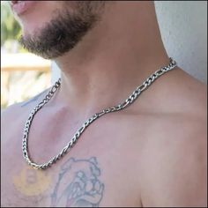 The Bellamy Stainless Steel Figaro Chain Necklace is a nod to timeless style and quiet strength. This silver-tone chain boasts a simple yet unique pattern that sets it apart. As you fasten it, the smooth texture against your skin creates a sense of understated luxury. Consider this necklace a potential staple piece in every modern man's collection – versatile, dependable, and undeniably stylish. Specifications:Metal: Stainless SteelColor: Silver-toneFinish: Polished When it comes to men’s necklaces, stainless steel brings strength, shine, and street cred to the table. Stainless Steel necklaces interlock metal rings, discs, or beads in badass textures perfect for the modern man. From chunky Cuban links with an edgy urban appeal to low-key beads that let pendants pop, the BERML stainless cha Jewelry For Men