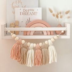 a shelf that has some tassels on it