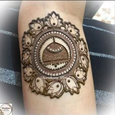 a henna tattoo is shown on the arm