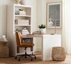 an office with a desk, chair and bookshelf