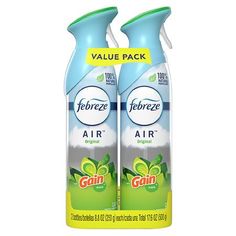 two bottles of air freshener on a white background