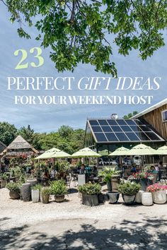 the words 23 perfect gift ideas for your weekend host in front of an outdoor cafe