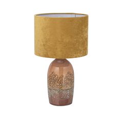 a table lamp with a gold shade on it and a brown fabric lampshade