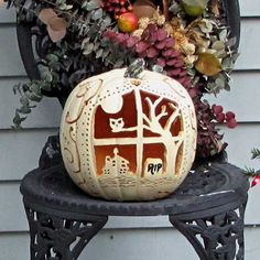 a carved pumpkin sitting on top of a table