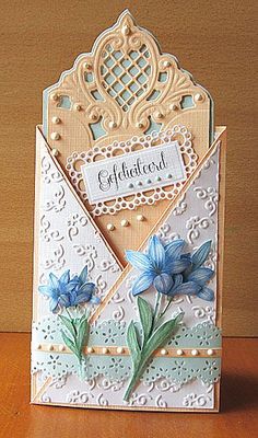 a close up of a card with flowers on it