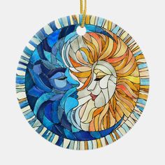 a stained glass sun and moon ornament