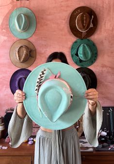 Our Fonte Tulum hats have a classic full length brim of 9 cm, wich perfectly shades the face from the summer sun. Each piece is unique due its artisanal elaboration. The magical hands of the artisans unite with the current vision of our designs. From Tulum to the world. Sizes: M: Circumference is 56-58cm and fits most head sizes. L: Circumference is 60-62cm. Both sizes include an adjustable string inside for a secure fit. Handmade Blue Wide Brim Fedora, Adjustable Green Felt Hat For Beach, Adjustable Green Felt Hat For Summer, Turquoise Curved Brim Hat For Country Events, Turquoise Short Brim Hat For Country Events, Turquoise Hats For Country Events With Short Brim, Turquoise Fedora Hat For Spring, Turquoise Hat For Summer Country Events, Turquoise Fedora For Spring