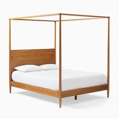 a bed with a wooden frame and white sheets on it's headboard, in front of a white background