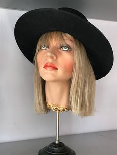 "Hard structure black felt hat. Seems to be an early hat, maybe as early as the 1930's. In good vintage condition. Measurements are: Circumference21\" Dome4\" Brim3\" Feel free to convo me with any further questions. Thank you for your interest." Classic Black Flat Cap Felt Hat, Black Felt Hat With Short Brim, Classic Black Fedora Costume Hat, Vintage Black Costume Hat With Flat Brim, Vintage Black Flat Brim Costume Hat, Classic Black Wide Brim Costume Hat, Vintage Black Adjustable Boater Hat, Vintage Adjustable Black Boater Hat, Classic Black Mini Hat With Wide Brim