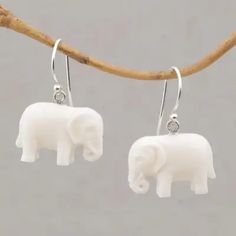 Sleek Cow Bone Carved Elephant Earrings with Silver Hooks - White Elephant | NOVICA Carved Elephant, Cow Bones, Elephant Earrings, White Cow, Printed Jewelry, Flip Flop Shoes, Bone Carving, Earrings White, Premium Gift