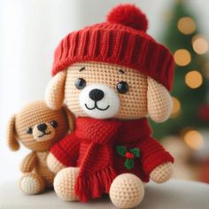 there is a stuffed dog with a knitted hat and scarf next to a teddy bear