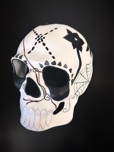 Immerse yourself in the rich symbolism of the Day of the Dead with our elaborately designed skull mask. Every detail is meticulously crafted to honor the beauty of life and remembrance. The contrasting colors of black and white evoke a timeless and dramatic flair, making this mask the perfect accessory for any Day of the Dead celebration.


Age Group/Gender - Adult/Men

Size/Type - One size fits all adults

Mask Color - White/Black

Mask Material - Polyresin Artistic White Masks And Prosthetics For Halloween, Day Of The Dead Celebration, Black Masquerade, Mens Masquerade Mask, The Beauty Of Life, The Day Of The Dead, Day Of The Dead Skull, Beauty Of Life, Men's Day