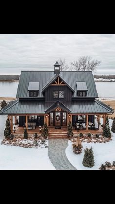 this is an aerial view of a house in the wintertime with snow on the ground