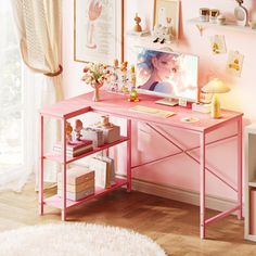 a pink desk with pictures on the wall