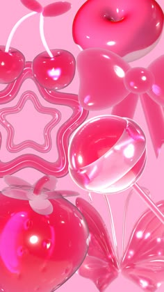 an apple and some candy on a pink background with other candies in the shape of hearts