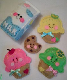 there are six decorated cookies in the shape of animals and ice creams on top of each other