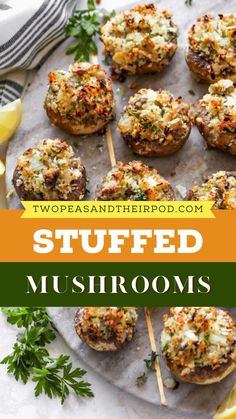 stuffed mushrooms with parmesan cheese and herbs on skewers are served on a platter