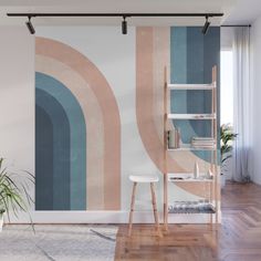 an abstract wall mural with pink and blue stripes