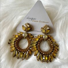 Beautiful Handmade Designer Deepa Gurnani Large Statement Earrings. New With Tags. These Are Definitely Runway Worthy! They Have Crystals And Stainless Steel Beads With A Felt Backing, Which Makes Them Surprisingly Light Weight. These Measure 2.5" X 1.75" At Their Longest Points. Perfect For Any Occasion That You Need To Give Your Outfit A High Fashion Lift! Elegant Yellow Beaded Dangle Earrings, Handmade Yellow Bohemian Teardrop Earrings, Yellow Beaded Chandelier Drop Earrings, Elegant Yellow Chandelier Earrings As Gift, Elegant Yellow Drop Earrings, Handmade Yellow Earrings For Party, Yellow Jeweled Jewelry For Party, Yellow Bohemian Earrings For Festive Occasions, Festive Yellow Beaded Earrings