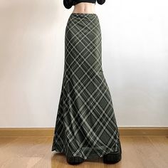 Indulge in the luxury of our Retro Plaid Low Waist Maxi Skirt. The low-rise fit beautifully accentuates your curves, while the retro plaid pattern adds timeless sophistication. Featuring a mesh overlay and elegant mermaid design, this ankle-length skirt is perfect for making a statement at any exclusive event. Low-rise fit for curve accentuation Retro plaid pattern for timeless style Mesh overlay for added elegance Mermaid design for a dramatic flair Ankle-length perfect for exclusive events Elegant Fitted Plaid Skirt, Elegant Plaid Skirt, Chic Fitted Plaid Skirt, Plaid Fitted Mini Skirt, Fitted Plaid Mini Skirt, Elegant Fitted Plaid Bottoms, Fitted Plaid Pencil Skirt, Fitted Retro Plaid Skirt, Retro Fitted Plaid Skirt