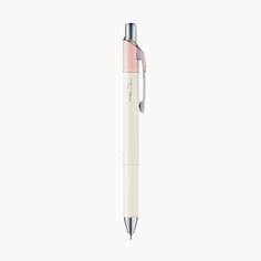 a pen that is sitting on top of a white surface and has a pink tip