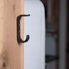 an open door with a black handle on it