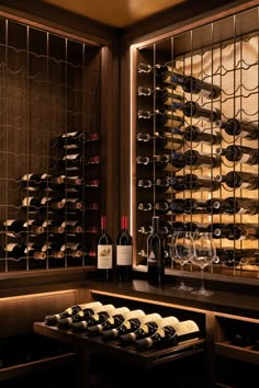 a wine cellar with many bottles and glasses