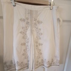 Vtg Low Waist Old Navy White Skirt W Silver Embroidery Unworn W Tags Fitted White Skirt With Embroidered Hem, Elegant White Skirt With Embroidered Hem, Vintage White Lined Skirt, Traditional White Embroidered Skirt, White Bohemian Skirt With Embroidered Hem, Bohemian White Skirt With Embroidered Hem, Navy Mini Skirt, Satin Slip Skirt, Lace Babydoll Dress