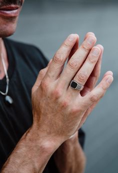 "Men Onyx Rings/ Squircle Onyx Ring/ Black Onyx Signet/ Silver Onyx Men Ring/ Onyx Ring Men/ Onyx Signet Ring Men/ Black Stone Ring Men This simple men's signet ring is made of sterling silver and black square onyx stone. On the sides of the band there are some geometrical lines in oxidized. This nice Onyx ring is a classic that matches perfectly with any look. Impressive and elegant, perfect for any occasion. You'll be amazed at how comfortable it feels on your hand. The band of the ring is roundish specially designed to not to disturb your fingers. The surface of the square is 5mm x 5mm. Urban jewelry, for those who not only want to wear special designs but also with meaning. Name of the ring: AROUNI...The journey has to feel the way you want the destination to feel. Every time we make a Black Onyx Engagement Ring Men, Black Stainless Steel Open Ring, Black Stone Ring For Men, Black Onyx Ring Men, Stone Ring Men, Onyx Rings, Stone Rings For Men, Onyx Ring Men, Open Cuff Ring